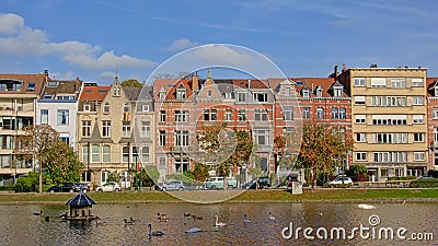 Row of houses in eclectic art nouveau style on the embankment of Ixelles lakes Editorial Stock Photo