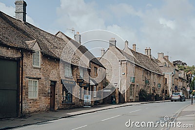 Row of local shops on the main street in Stow-on-the-Wold, Cotswolds, UK Editorial Stock Photo