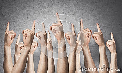 Row of man hands showing finger pointing gesture Stock Photo