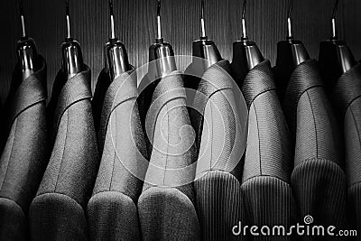 Row of men suit jackets. Stock Photo