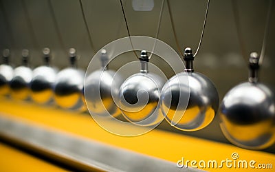 Row of metallic balls for inertia experiments Stock Photo