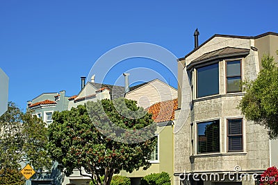 Row of modern houses or townhomes in downtown city historic districts of suburban san francisco california Stock Photo