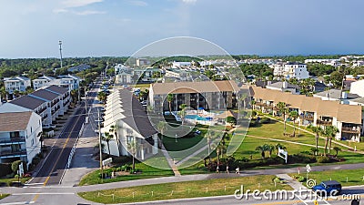 Row of multiple story beach condominium, apartment and vacation rental neighborhood, beach community along 98 Scenic Gulf Drive Stock Photo