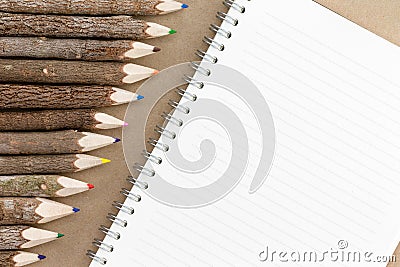 Row of natural wood colored pencil crayons Stock Photo