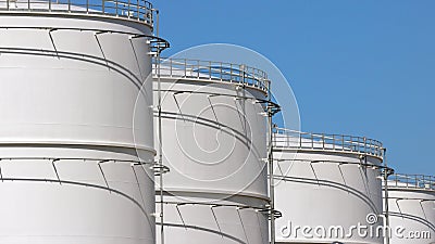 Row of oil storage tanks Stock Photo