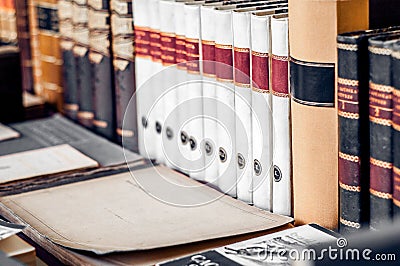 Old books background. Stack of books in a row. Stock Photo