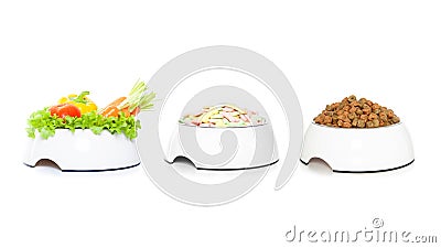 Row of 3 pet food bowls Stock Photo