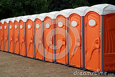 Row of Portable Toilets Stock Photo