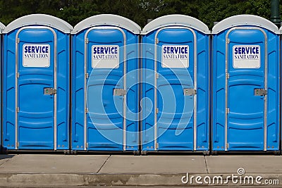 Row of Portable Toilets Stock Photo