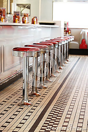 Bar stools in a fifties style diner. Stock Photo