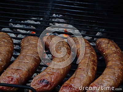 Row of sausages on a barbaque Stock Photo