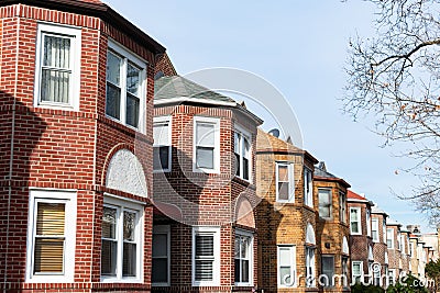 Row of Similar Old Brick Homes in Astoria Queens New York Stock Photo