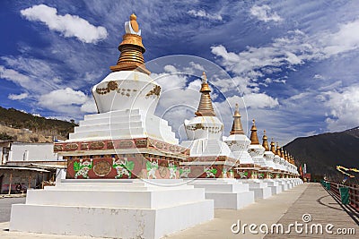 Row of stupas at the gate of Deqing city, Yunnan, China Stock Photo