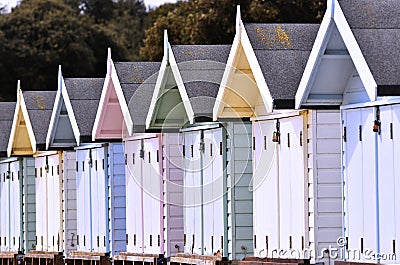 Beach huts in a row Stock Photo