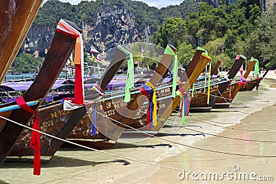 Row of traditional longtail boats in thailand Editorial Stock Photo