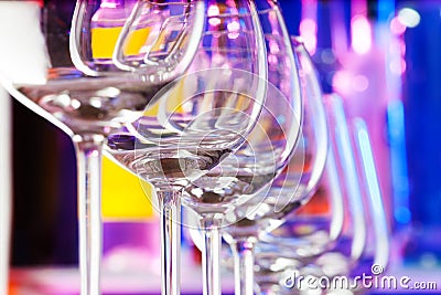 Row of transparent wine glasses in the bar Stock Photo