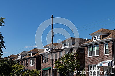 Row of Two Story Brick Homes in Woodside Queens of New York City Editorial Stock Photo