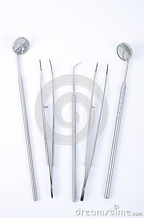 Row of various dental tools on white Stock Photo