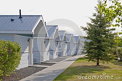 Row of wooden cottages Stock Photo