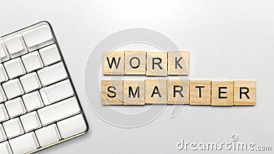 The row of wooden cubes with 'work smarter' text Stock Photo