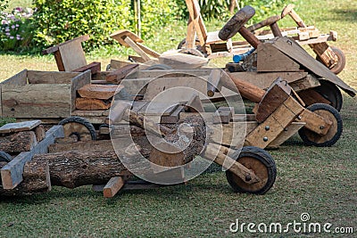 A row of wooden tricycles in the hilltribe village. Stock Photo