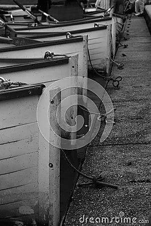 Rowboats in a Line on the Lake Stock Photo