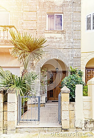 Authentic residential building with balconies in Malta Stock Photo