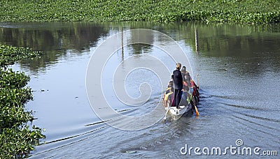Rowing boat sport team practice on river in outdoor Editorial Stock Photo