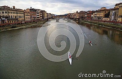 Rowing boats on the Arno in Florence, italy Editorial Stock Photo