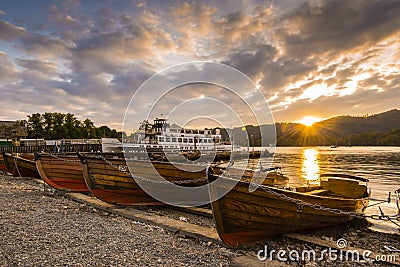 Rowing boats lake sunset Stock Photo