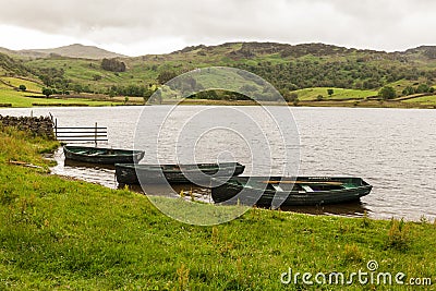 Rowing Boats on Watendlath Tarn. Watendlath, English Lake District. Stock Photo