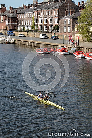 Rowing on the river Ouse in York North Yorkshire Editorial Stock Photo