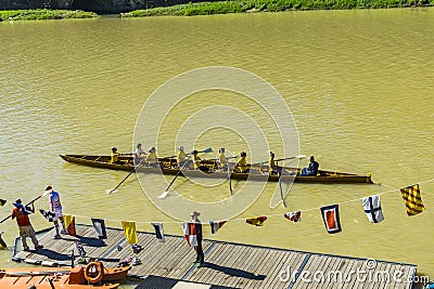 Rowing training on the Arno river in Florence, Italy Editorial Stock Photo