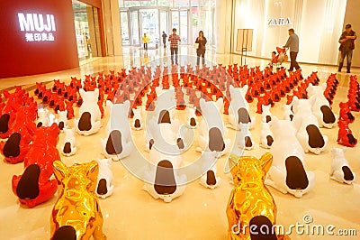 Shenzhen, China: rows of animal statues are displayed as landscapes in the large shopping square Editorial Stock Photo