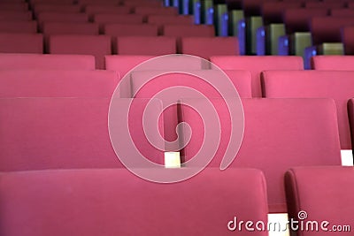 Rows of chairs in audience hall Stock Photo