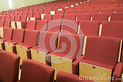 Rows of chairs in audience hall Stock Photo