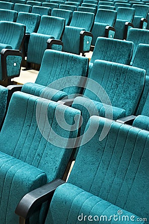 Rows of chairs in auditorium Stock Photo