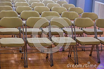 Rows of chairs in auditorium Stock Photo