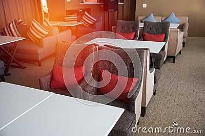 Rows of chairs and table Stock Photo