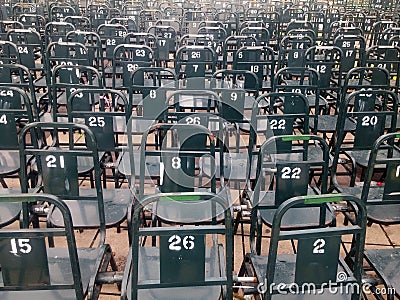 Rows of chairs are neatly arranged in the square Stock Photo