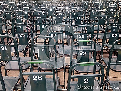 Rows of chairs are neatly arranged in the square Stock Photo
