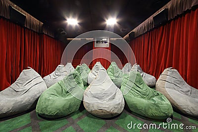 Rows of comfortable seats like sacks in movie theater Stock Photo