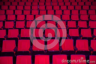 Rows of empty theater seats Stock Photo