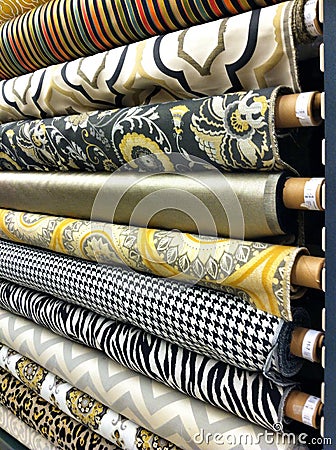 Rows of fabric bolts of material Stock Photo