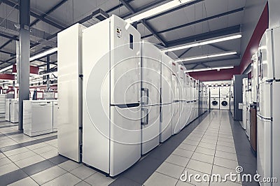 Refrigerators and washing mashines in appliance store Stock Photo