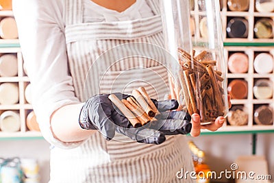 Rows of glasses with grinned herbs and spices Stock Photo