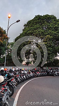 Rows of motorbikes neatly arranged in the Alun-alun kidul, Yogyakarta Editorial Stock Photo