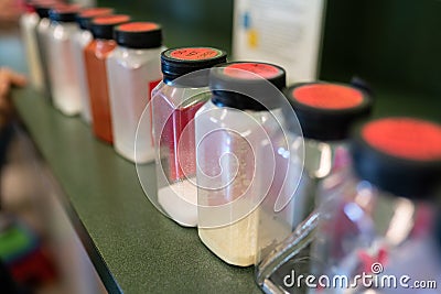 Rows of plastic bottles with chemicals Stock Photo