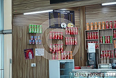 Rows of Pringles Snacks inside hypermarket. Owned by the Kellogg Company, Pringles is a brand of potato snack chips. Assorted Editorial Stock Photo