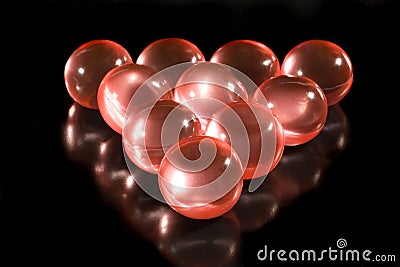 Rows of red aromatic bath balls Stock Photo